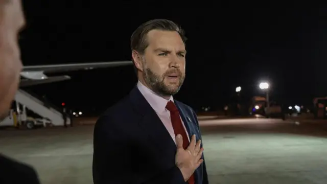 JD Vance speaks to the media before boarding Air Force Tw