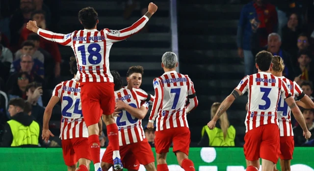 Atletico Madrid's Julian Alvarez celebrates scoring their first goal with teammates