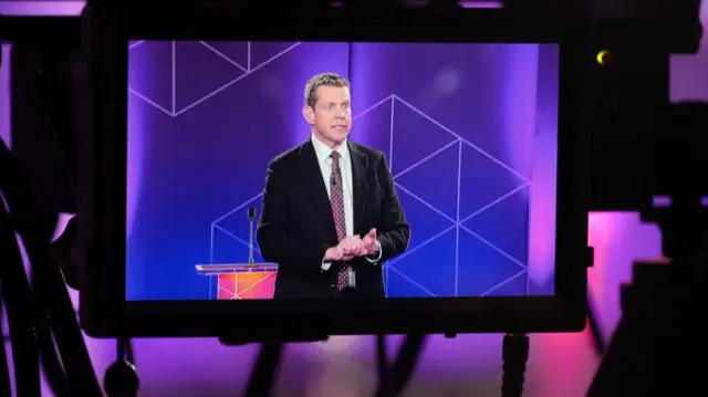 Rhun ap Iorwerth on a camera screen.