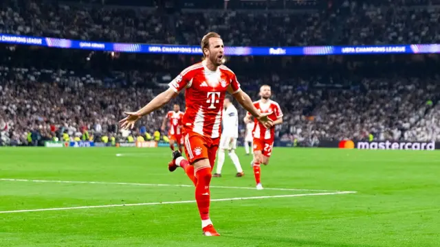 Harry Kane celebrate scoring for Bayern Munich at the Bernabeu.