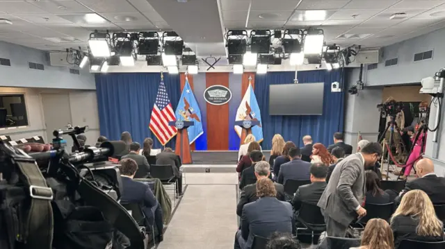 Pentagon press briefing room full of reporters