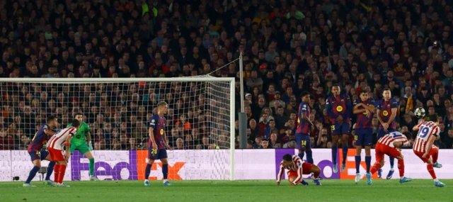 Atletico Madrid's Julian Alvarez scores their first goal