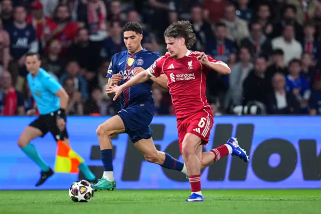 Milos Kerkez of Liverpool battles for possession with Achraf Hakimi