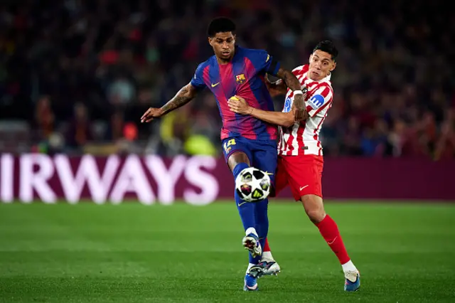 Marcus Rashford of FC Barcelona competes for the ball with Nahuel Molina