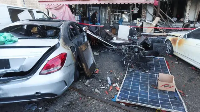 The aftermath of an Israeli strike in Sidon, Lebanon, seen on Wednesday morning