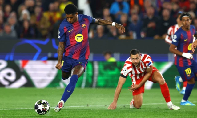 FC Barcelona's Marcus Rashford shoots at goal