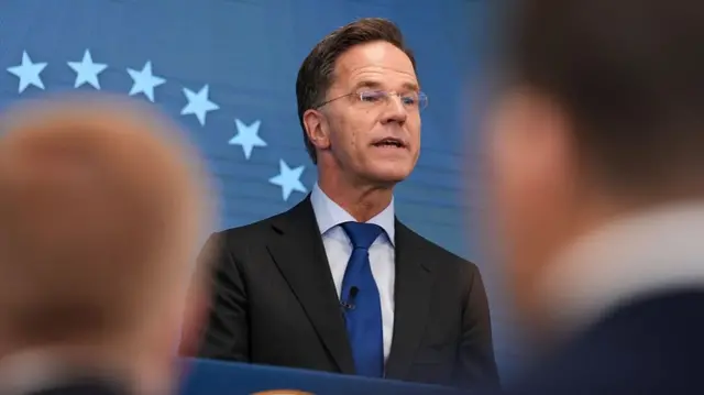 Mark Rutte speaking in Washington, in front of reporters