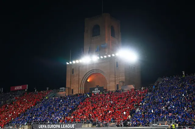 Fans stand in Bologna colours