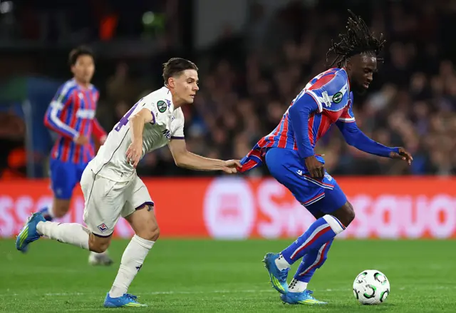 Guessand's shirt is pulled as he tries to run away
