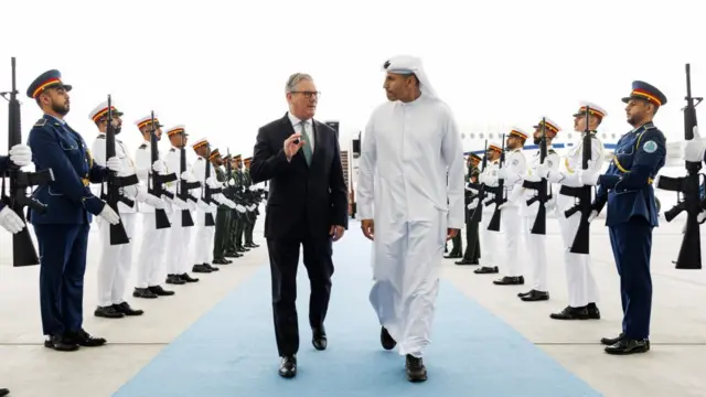 Keir Starmer (L) with Emirati government official Khaldoon Al Mubarak (R) during a visit to Abu Dhabi, United Arab Emirates 09 April 2026