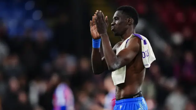 Sarr claps the fans at full time