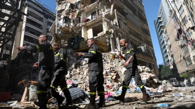 Rescuers work at the site of an Israeli strike carried out on Wednesday, in Ain Al Mraiseh in Beirut, Lebanon on Thursday