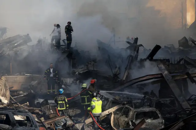 Rescuers work at the site of an Israeli strike in Beirut