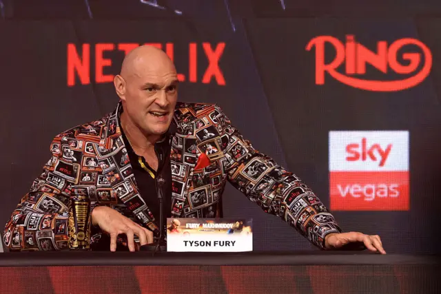 Tyson Fury speaks at a news conference