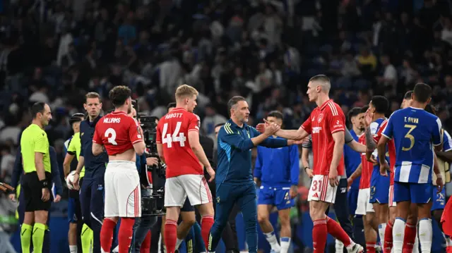 Forest players shake hands with Pereira at full time