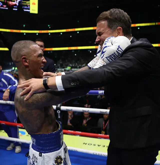 Conor Benn and Eddie Hearn hug