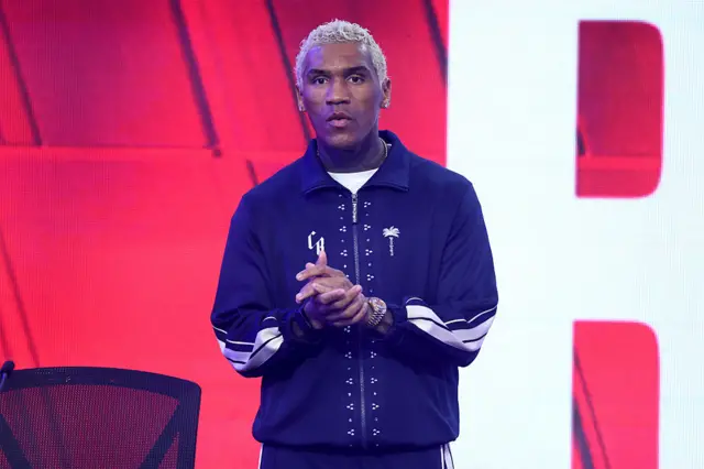 Conor Benn in blue and white tracksuit