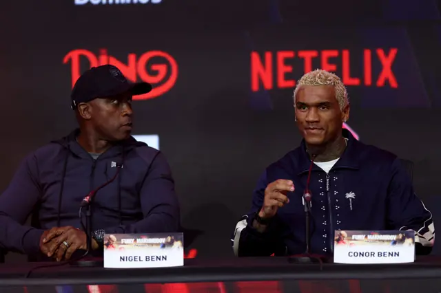 Nigel Benn and Conor Benn sit beside each other at a news conference