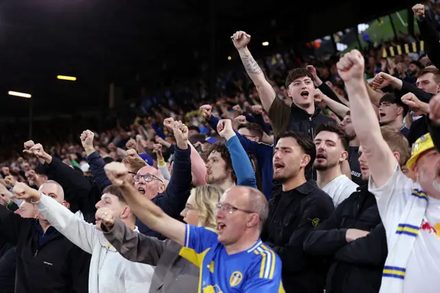 Leeds fans chant and cheer