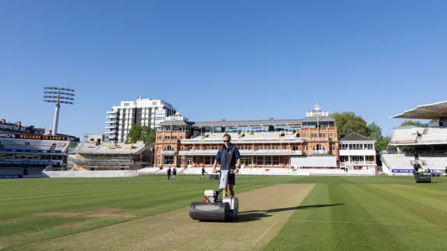 Groundsman rolling the pitch at Lord's