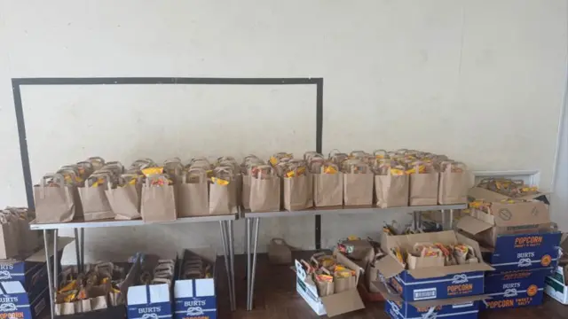 Brown bags containing lunches