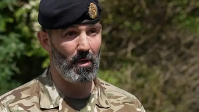 Col Nick Handy
