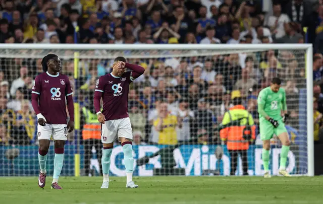 Burnley players look deflated after conceding