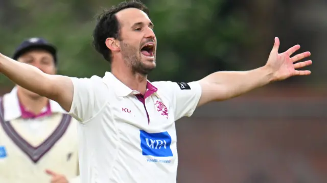 Lewis Gregory celebrates taking wicket