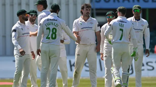 Leicestershire celebrate the wicket of Haseeb Hameed