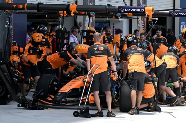McLaren perform a pit stop for Oscar Piastri