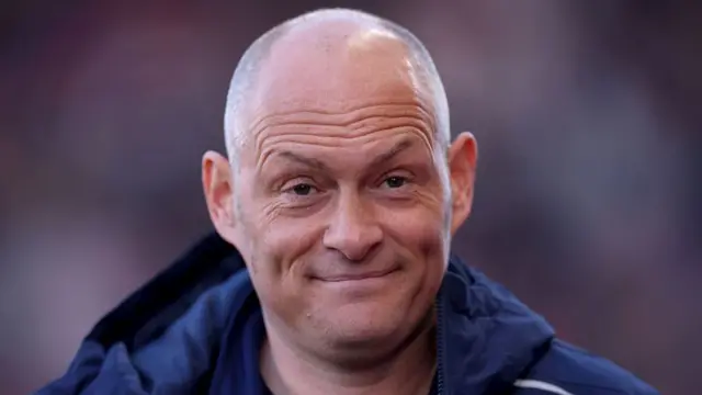 Millwall boss Alex Neil smiling