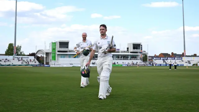 Gareth Roderick and Olly Hannon-Dalby leave the field