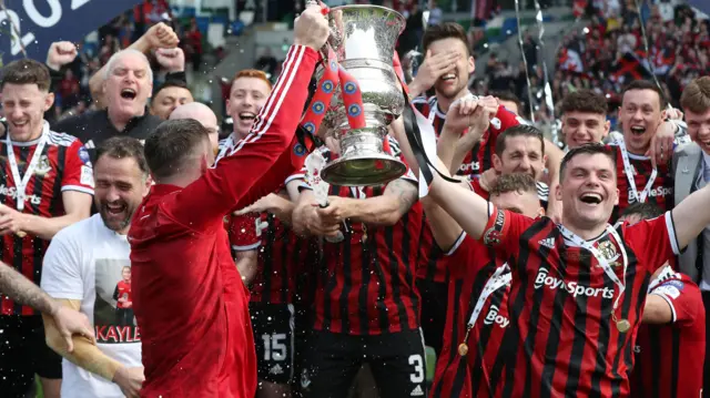 Philip Lowry lifting Irish Cup
