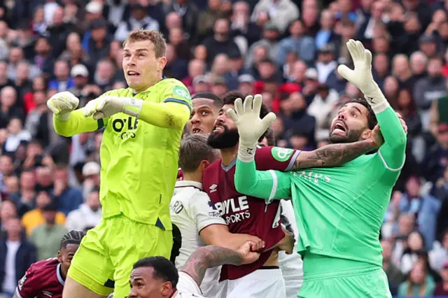 Pablo of West Ham United fouls David Raya of Arsenal resulting in a late equalising goal
