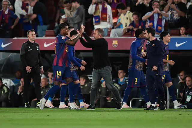 Marcus Rashford of FC Barcelona celebrates with Hansi Flick
