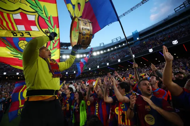 Barcelona fans inside the stadium before the match
