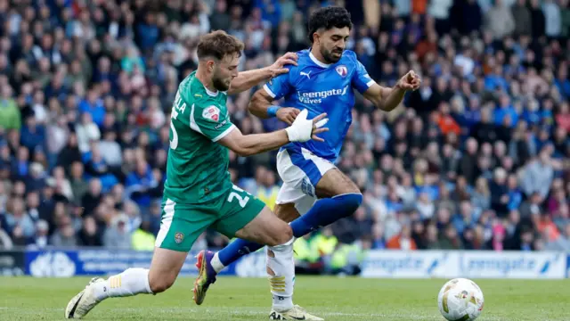 Dilan Markanday is fouled by Notts County's Nic Tsaroulla