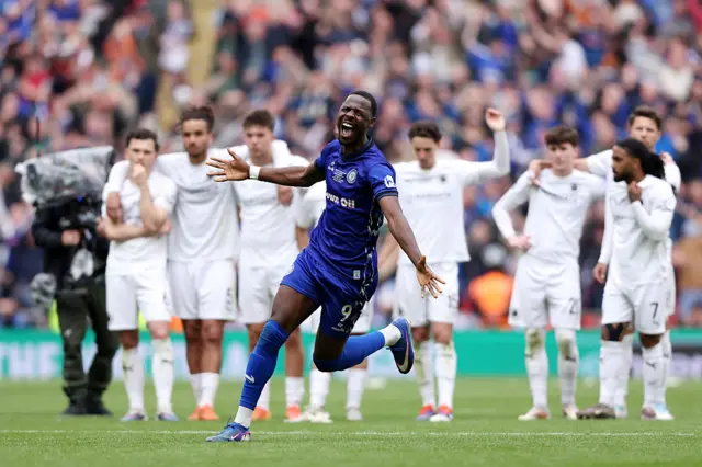 Mani Dieseruvwe of Rochdale celebrates victory after a penalty shootout