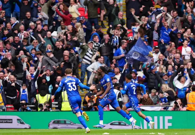 Rochdale's Mani Dieseruvwe (centre) celebrates