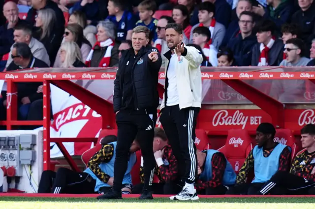 Eddie Howe (left) and assistant Jason Tindall on the touchline