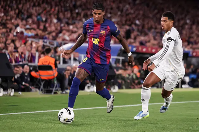 Marcus Rashford of FC Barcelona and Jude Bellingham of Real Madrid CF in action