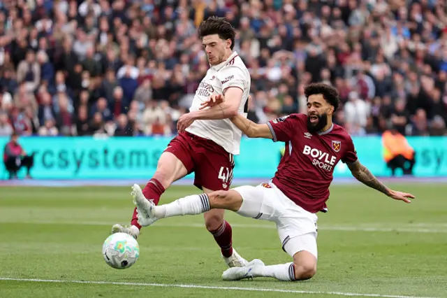 Declan Rice of Arsenal is challenged by Pablo of West Ham United