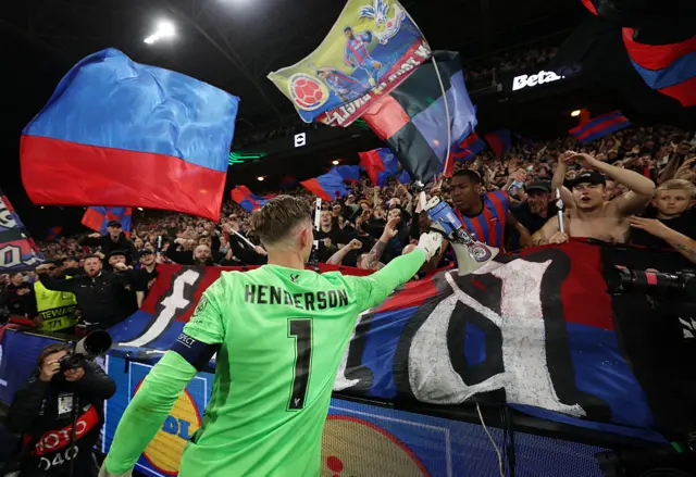 Dean Henderson interacts with the Crystal Palace supporters