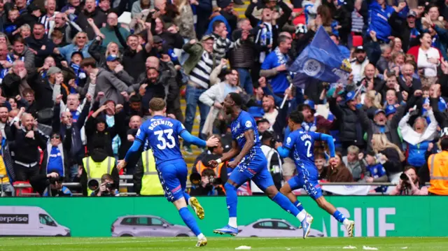 Rochdale's Mani Dieseruvwe (centre) celebrates scoring their side's second goal of the game