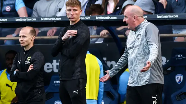 Chesterfield boss Paul Cook remonstrates with the match officials