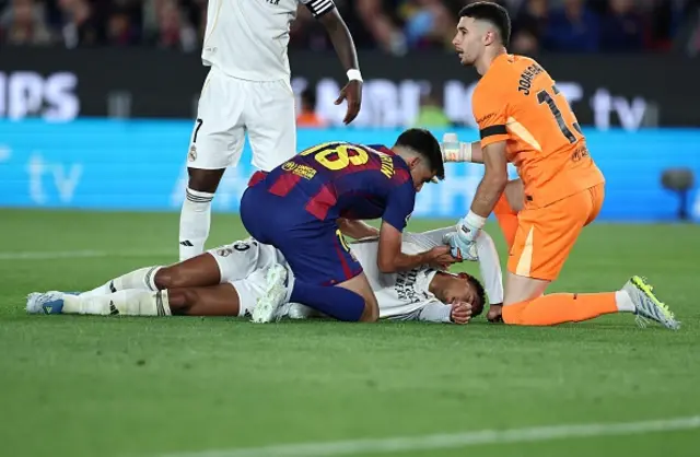 Jude Bellingham injured lies on the ground