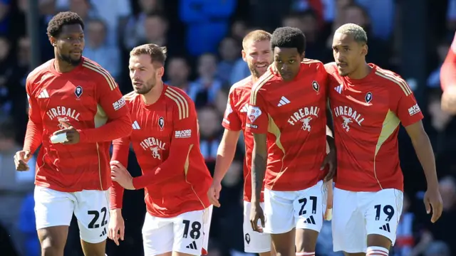 Salford celebrate a goal