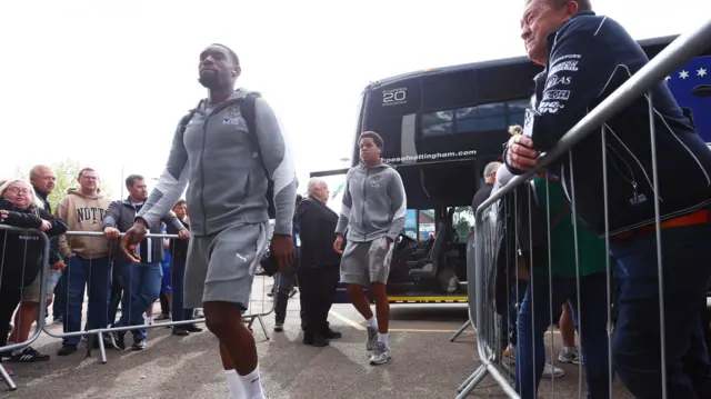 Notts County players arrive at the SMH Group Stadium