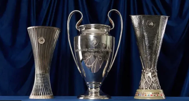 Conference League, Europa League and Champions League trophies