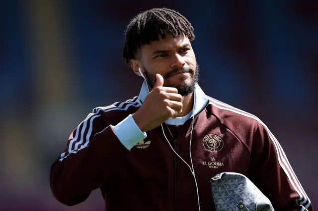 Tyrone Mings holds up his thumb